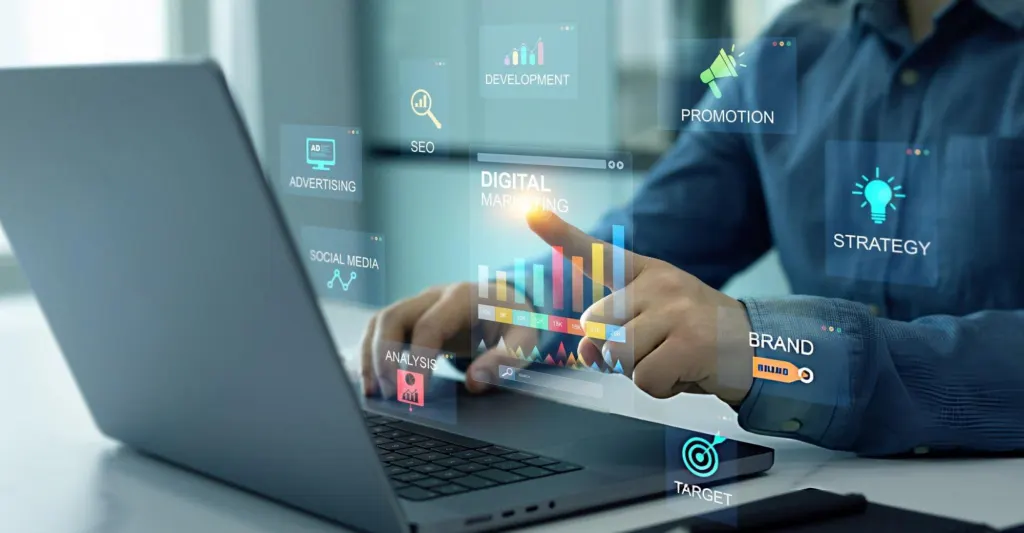 Marketer at a laptop surrounded by digital marketing services including SEO, advertising, social media, analysis and strategy