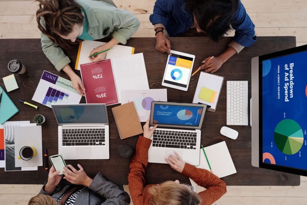 Marketing professionals planning a lead generation strategy to attract qualified business leads and increase customer conversions.